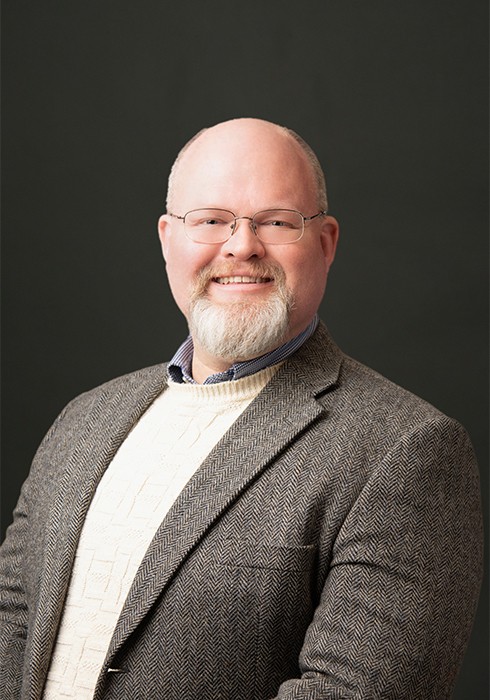 headshot of Adams, Stephen