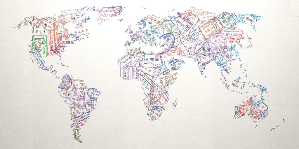 Passport stamps of different visa country in form of world map. Travel, tourism and immigration concept background.