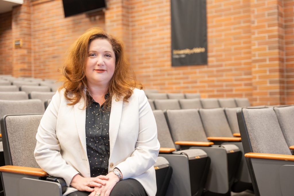 Dean Aviva Abramovsky sitting in college classroom.