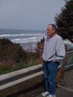 man standing by ocean