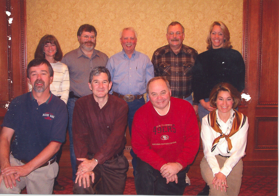 Group of people taking picture in 2005