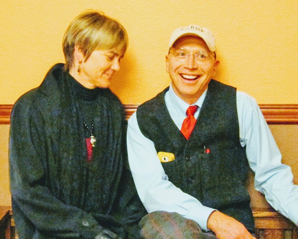 man and woman smiling