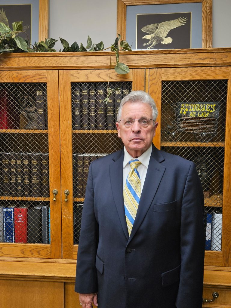 man in suit in a law office