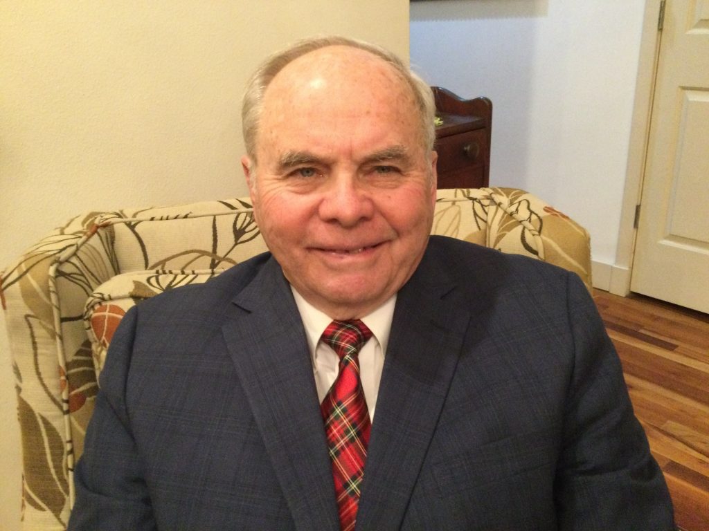 photo of larry hunter in suit and tie