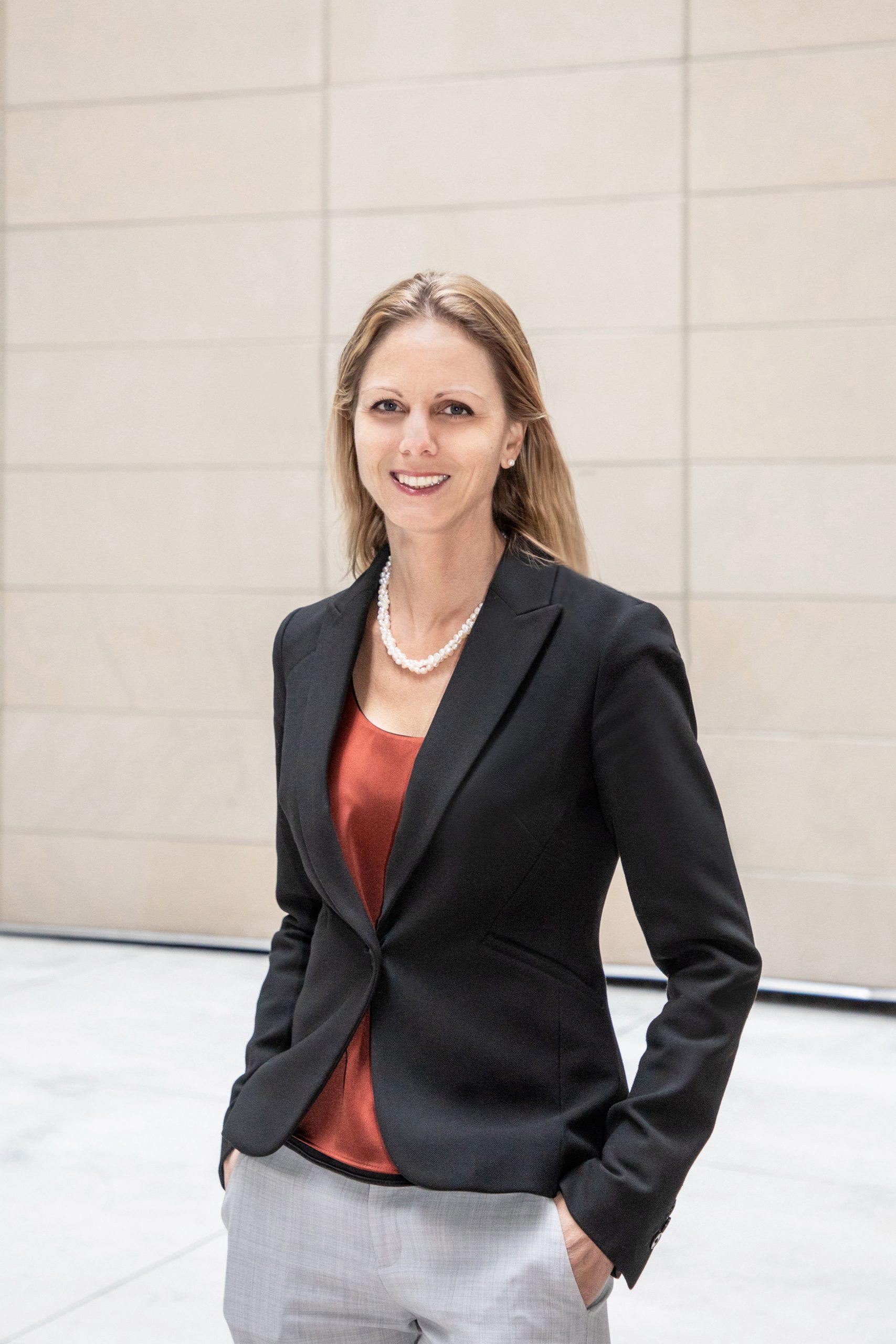 photo of Anita Hurlburt standing outside.