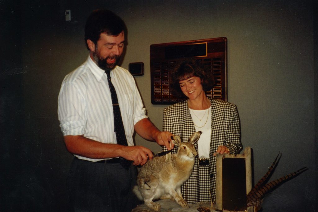 man and woman with stuffed rabbit