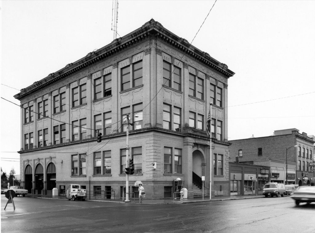 old building black and white street view