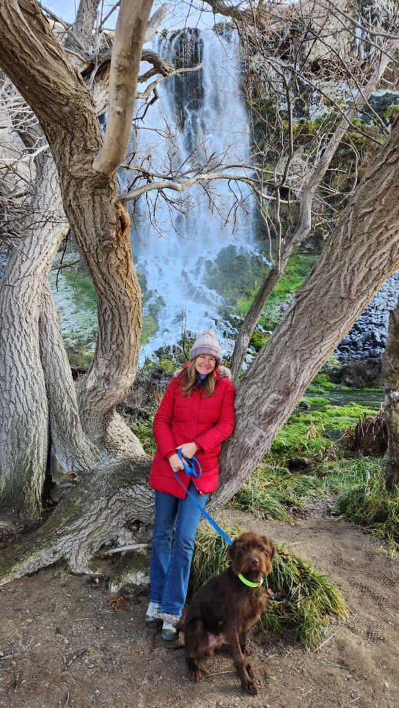 maureen braley hiking with dog in woods