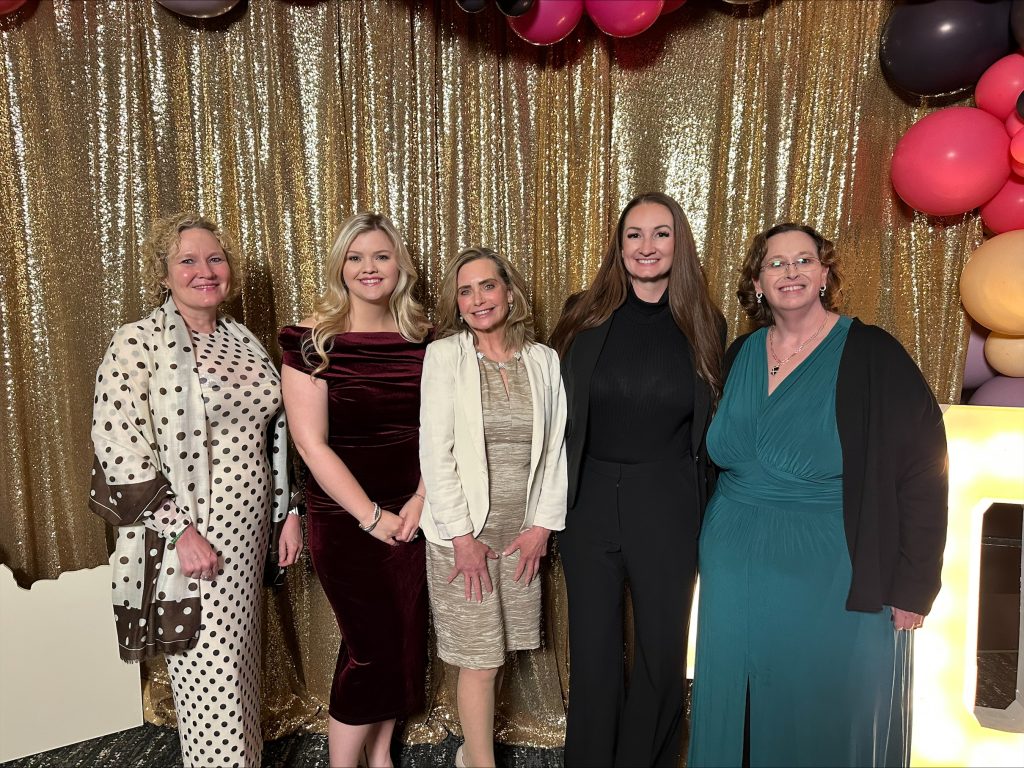 Kate with members of Idaho Women Lawyers at the 2026 IWL Gala.