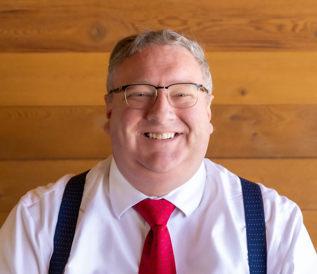 headshot of travis rice