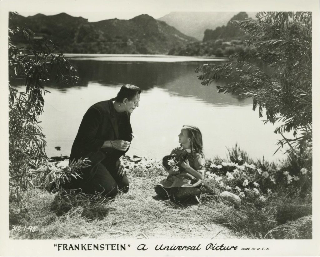 Frankenstein, with little girl from the black and white film.