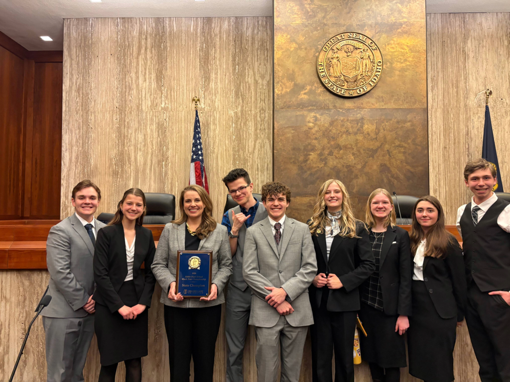 students and teacher smiling, ambrose winners for 2026 mock trial