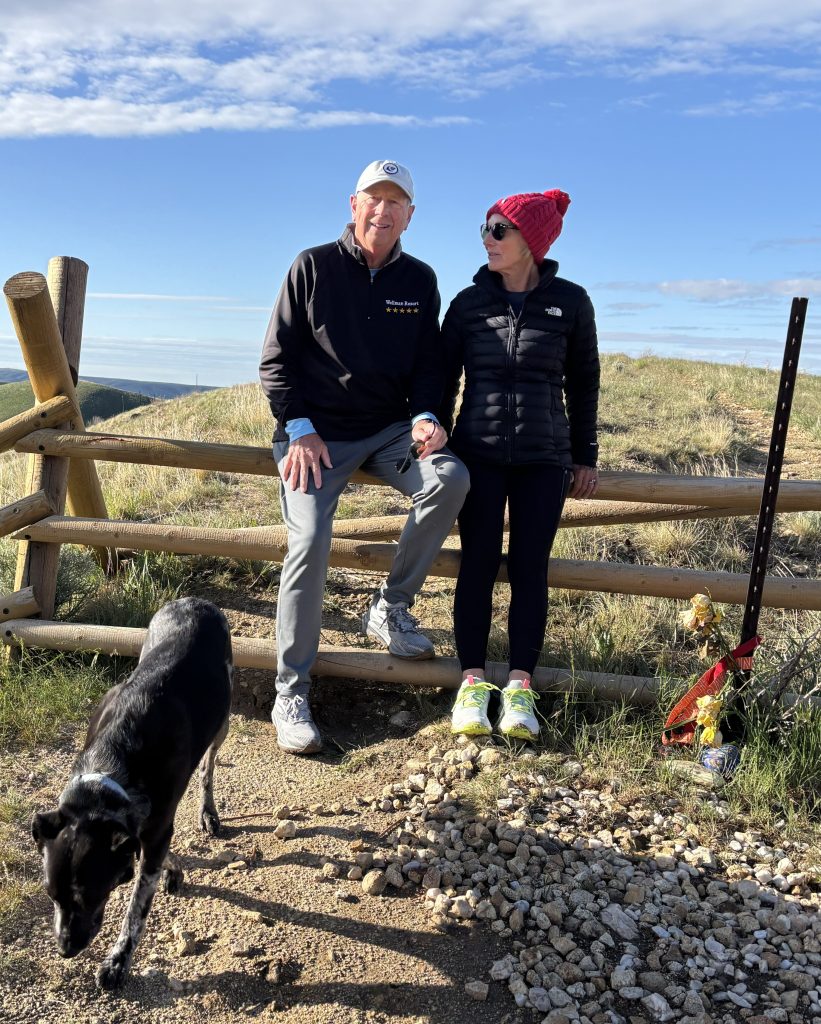 Bill and Debbie with their dog, Cedar, on the
Homestead Trial in the Boise Foothills. 