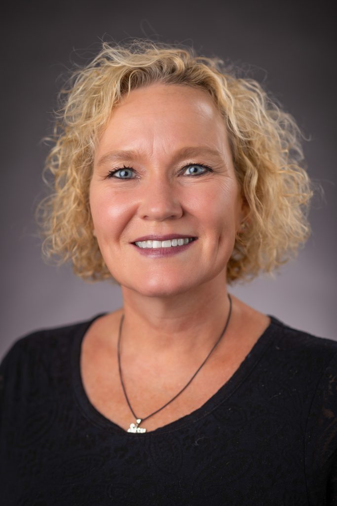 headshot of carole wesenberg.